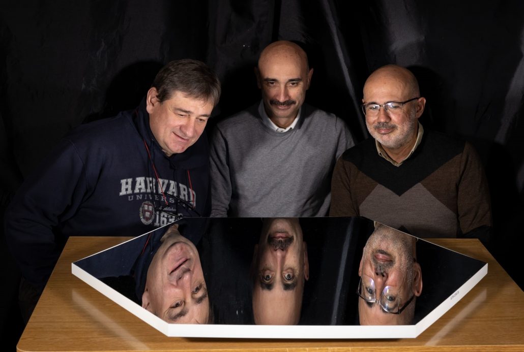 In the image above: a completed mirror with some team people: from left to right, Giovanni Pareschi (ASTRI Mini-Array Project PI), Salvatore Scuderi (Program Manager) and Nicola La palombara (Product Assurance Manager). Credit: Inaf Brera.